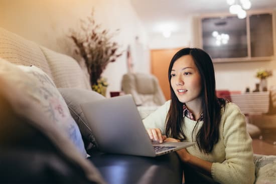 photo of woman working on laptop