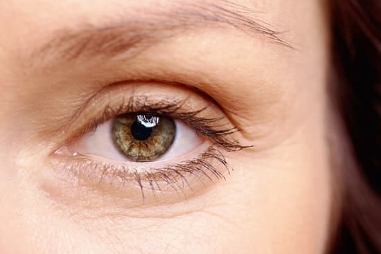 photo of close up of woman's eye