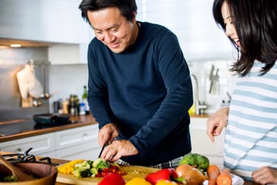 couple cooking healthy meal